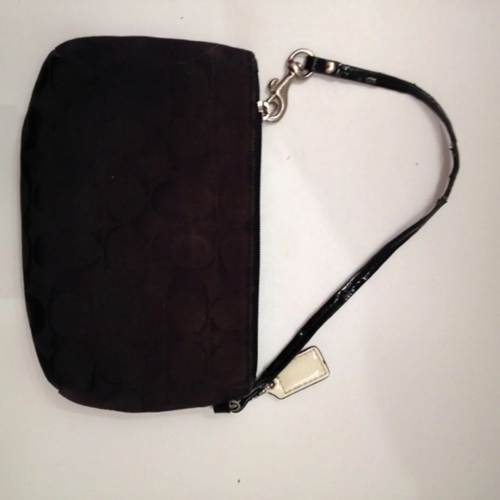 Coach black signature c wristlet clutch bag